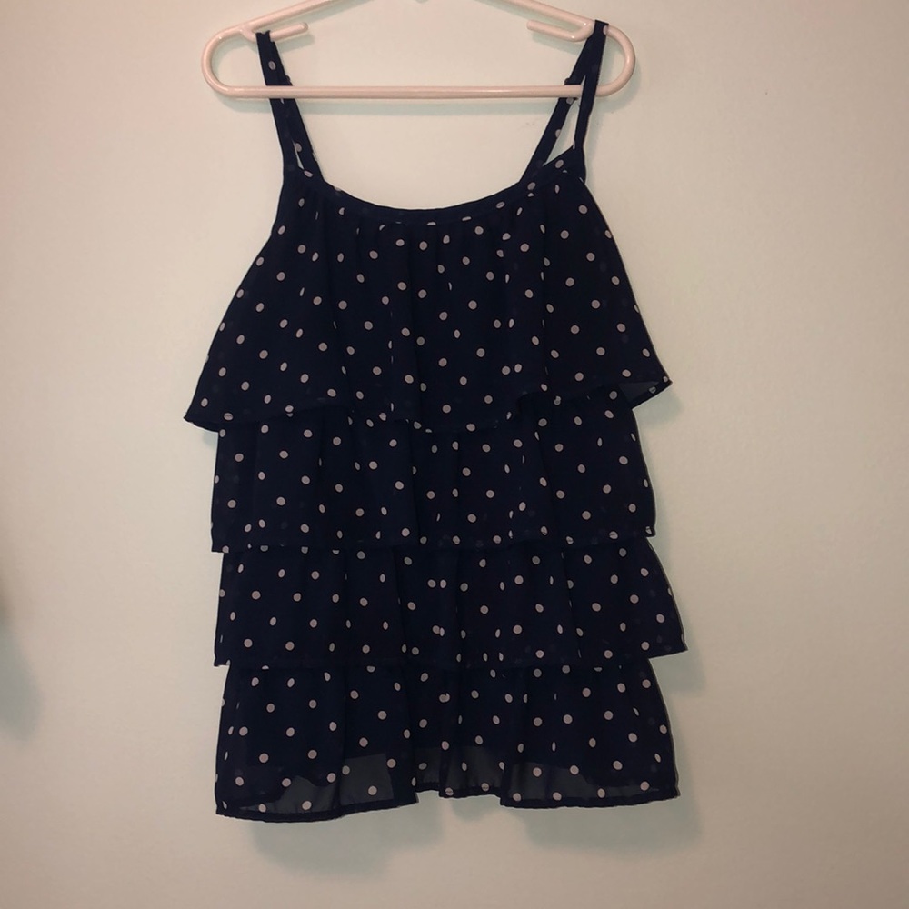 navy blue shirt with white polka dots
